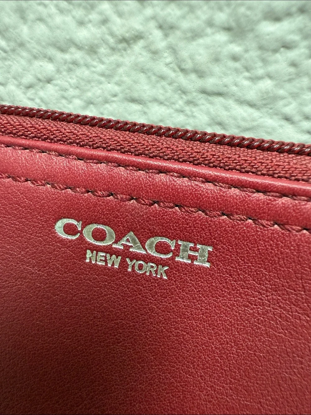 Coach sleek leather